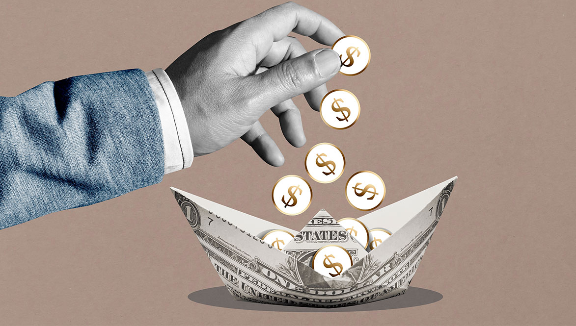 us money coins dropping into paper dollar