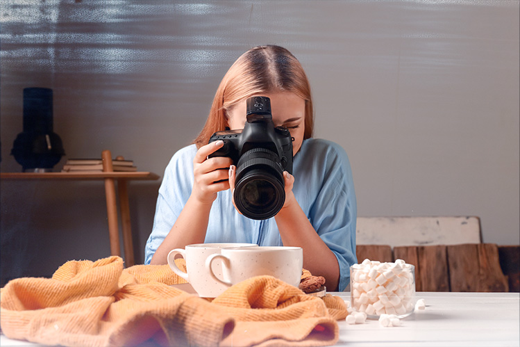 person taking photo of product
