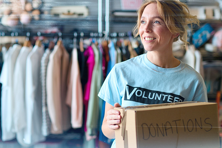 volunteer working sorting donations