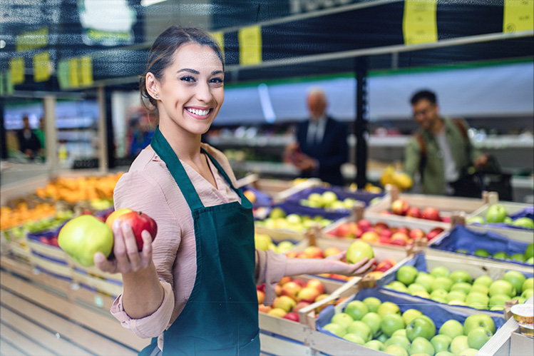 Fruit Stand Worker with Apples