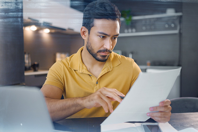Person reviewing paperwork